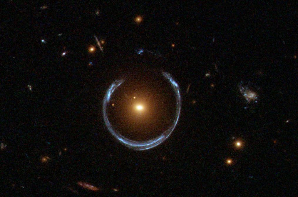 The notable gravitational lens known as the Cosmic Horseshoe was discovered in 2007. New research reveals a presence of an Ultra Massive Black Hole containing 36 billion solar masses. Credit: NASA/ESA/Hubble The notable gravitational lens known as the Cosmic Horseshoe was discovered in 2007. New research reveals a presence of an Ultra Massive Black Hole containing 36 billion solar masses. Credit: NASA/ESA/Hubble